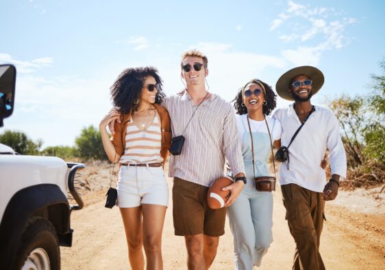 Travel, diversity and friends on a road trip for happy summer holidays, vacation and sunny caravan