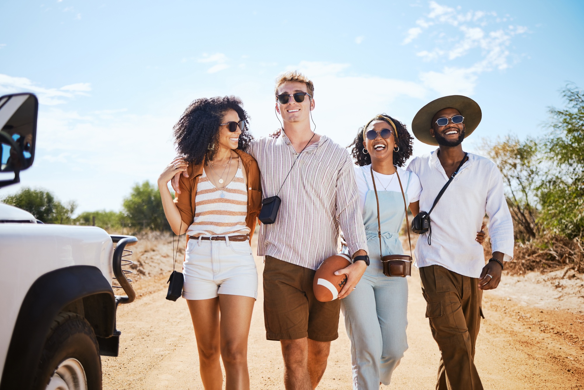 Travel, diversity and friends on a road trip for happy summer holidays, vacation and sunny caravan